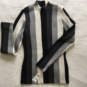 Ribbed INC sweater black, creme, gray and charcoal